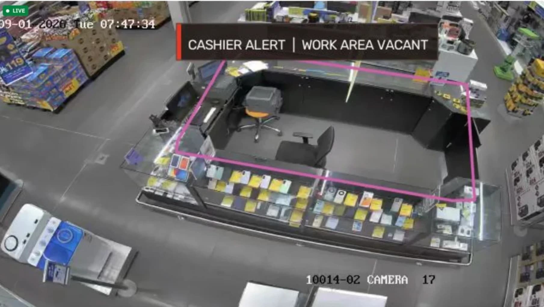 Live camera view of an empty cashier station with an automatic 'work area vacant' alert
